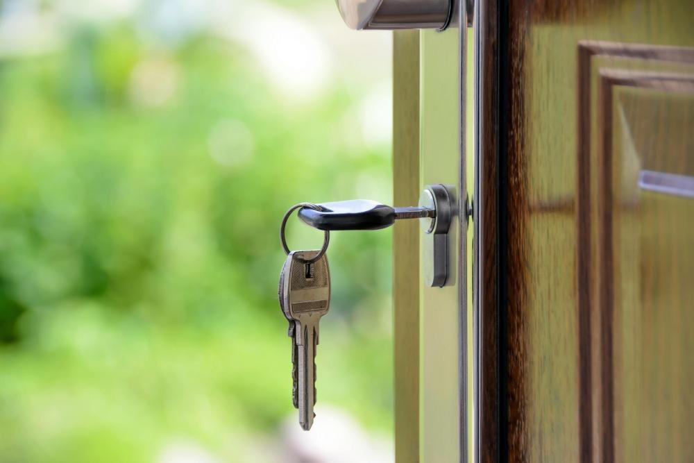 Traditional Door with Key inserted into a non-digital Lock